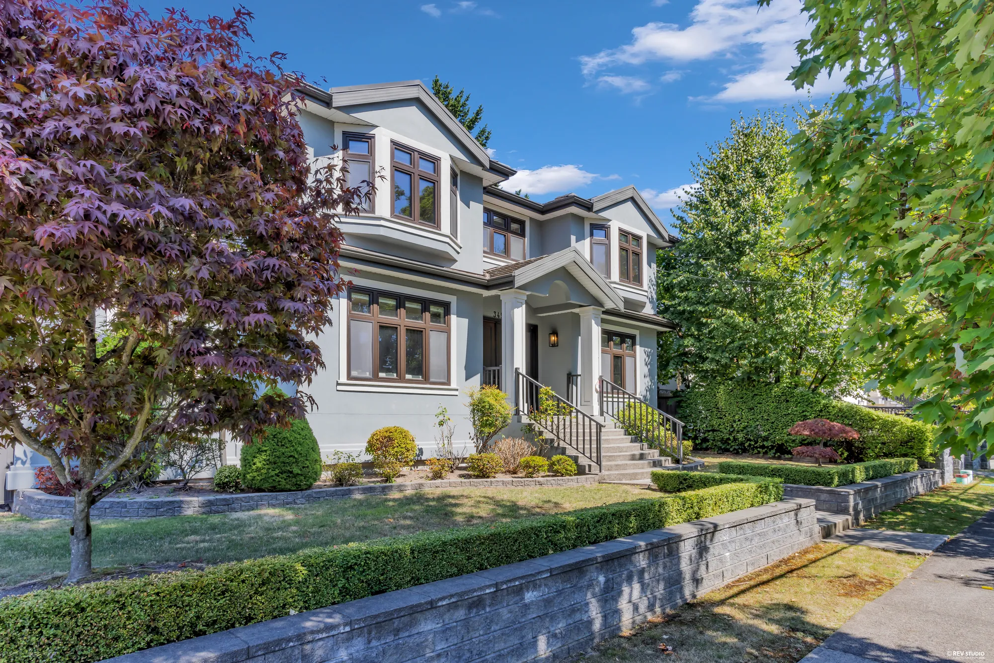 3491 West 40th Avenue from the west, a mature Japanese maple in the foreground
